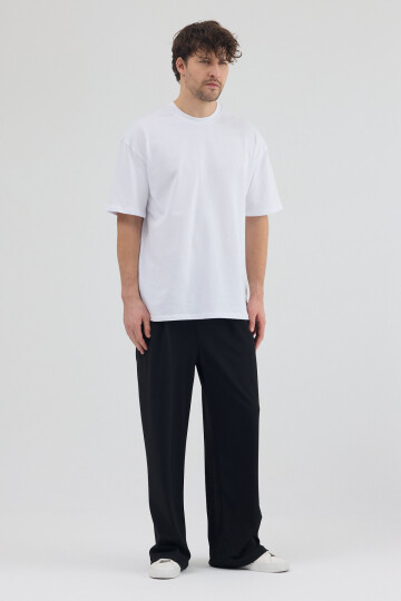 Siyah Dalgıç Kumaş Şardonlu Önü Pile ve Cep Detaylı Rahat Kesim Baggy Pantolon